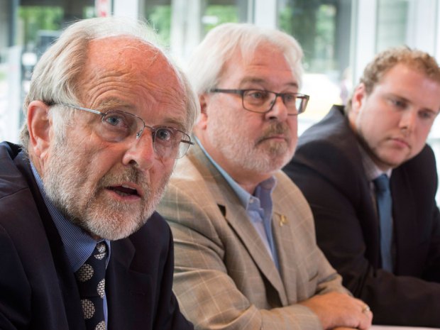 Thomas Walsh, left, lawyer, Daniel Roy, centre, Quebec director of the United Steel Workers - courtesy Canadian Press