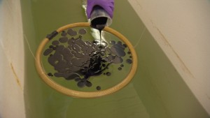 Scientists test bitumen spills in water tank - courtesy CBC
